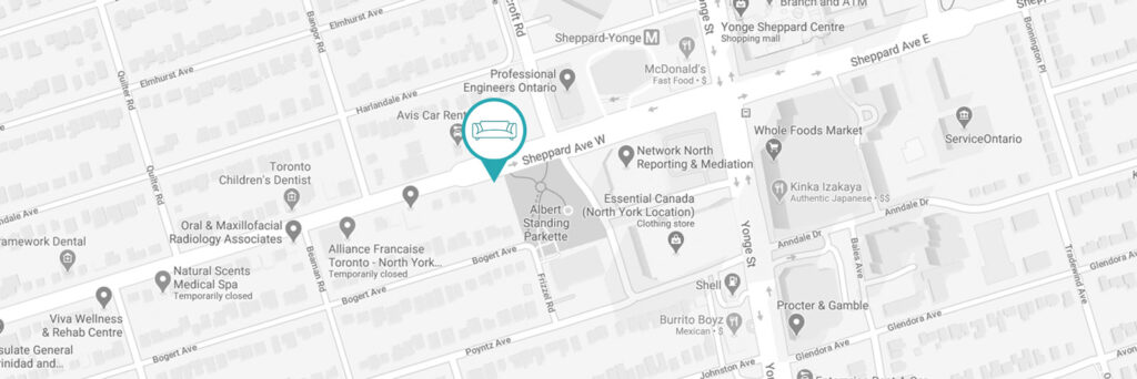 Map showing a teal pin with a couch icon marking a furniture-related location on a gray city map near Sheppard Ave W, Toronto.