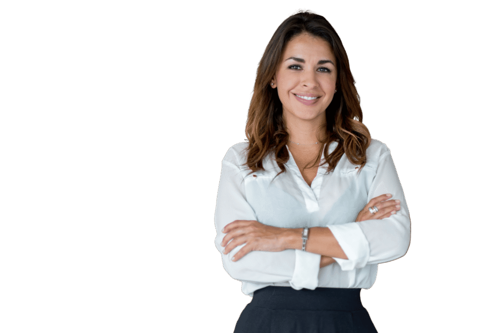 Smiling woman with brown hair in a white blouse and dark skirt, arms crossed